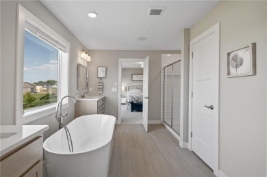 This Hillcrest Sport, constructed by Hanson, is the residence on Sundance Golf and Bowl in Minnesota - for sale on GolfHomes.com, golf home, golf lot
