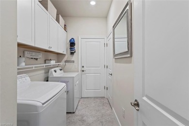 This IMMACULATE KENDRICK VILLA offers a peaceful PRESERVE VIEW on Panther Run Golf Club in Florida - for sale on GolfHomes.com, golf home, golf lot