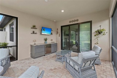 This IMMACULATE KENDRICK VILLA offers a peaceful PRESERVE VIEW on Panther Run Golf Club in Florida - for sale on GolfHomes.com, golf home, golf lot