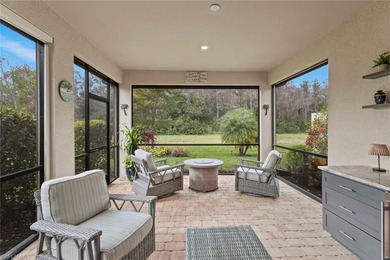 This IMMACULATE KENDRICK VILLA offers a peaceful PRESERVE VIEW on Panther Run Golf Club in Florida - for sale on GolfHomes.com, golf home, golf lot