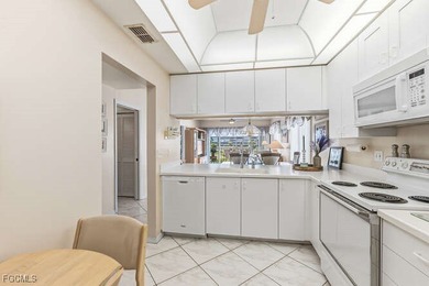 Stunning panoramic views of the golf course, lakes with lighted on Golfview Golf and Racquet Club in Florida - for sale on GolfHomes.com, golf home, golf lot