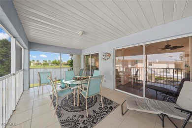 SUNLIGHT POURS IN OFF THE GLISTENING LAKE. Second floor end unit on Gulf Harbour Yacht and Country Club in Florida - for sale on GolfHomes.com, golf home, golf lot
