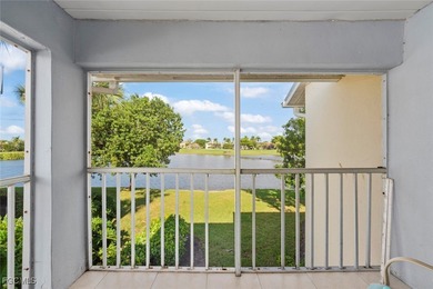 SUNLIGHT POURS IN OFF THE GLISTENING LAKE. Second floor end unit on Gulf Harbour Yacht and Country Club in Florida - for sale on GolfHomes.com, golf home, golf lot