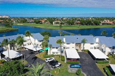 SUNLIGHT POURS IN OFF THE GLISTENING LAKE. Second floor end unit on Gulf Harbour Yacht and Country Club in Florida - for sale on GolfHomes.com, golf home, golf lot