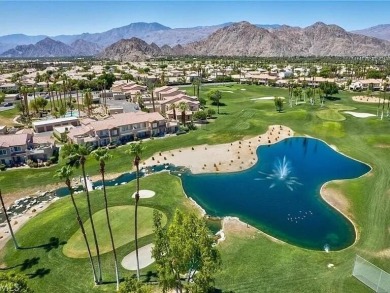 This condo features a premium location with lake, fairway and on Palm Royale Country Club in California - for sale on GolfHomes.com, golf home, golf lot