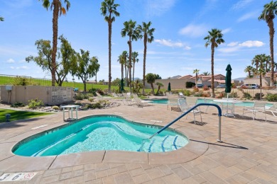 This condo features a premium location with lake, fairway and on Palm Royale Country Club in California - for sale on GolfHomes.com, golf home, golf lot