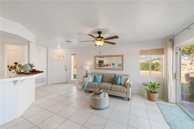 This condo features a premium location with lake, fairway and on Palm Royale Country Club in California - for sale on GolfHomes.com, golf home, golf lot