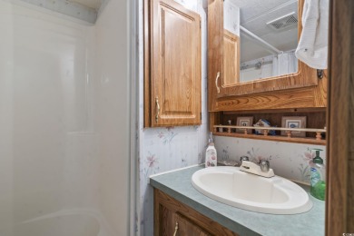 Your Coastal Getaway Awaits! Discover the perfect blend of on Tidewater Golf Club and Plantation in South Carolina - for sale on GolfHomes.com, golf home, golf lot