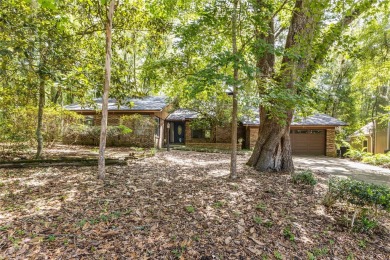 This charming and spacious residence sits on a large lot at the on Haile Plantation Golf and Country Club in Florida - for sale on GolfHomes.com, golf home, golf lot