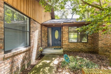 This charming and spacious residence sits on a large lot at the on Haile Plantation Golf and Country Club in Florida - for sale on GolfHomes.com, golf home, golf lot