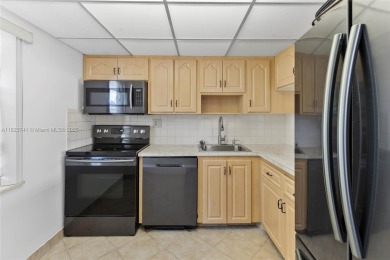 Motivated Seller! Beautifully updated 2BR/2BA condo in the on Oriole Golf and Tennis Club in Florida - for sale on GolfHomes.com, golf home, golf lot