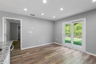 Welcome to this beautifully updated 3-bedroom, 2-bathroom home on Turkey Creek Golf and Country Club in Florida - for sale on GolfHomes.com, golf home, golf lot