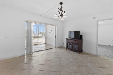 Motivated Seller! Beautifully updated 2BR/2BA condo in the on Oriole Golf and Tennis Club in Florida - for sale on GolfHomes.com, golf home, golf lot