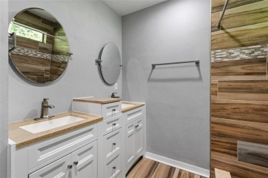 Welcome to this beautifully updated 3-bedroom, 2-bathroom home on Turkey Creek Golf and Country Club in Florida - for sale on GolfHomes.com, golf home, golf lot