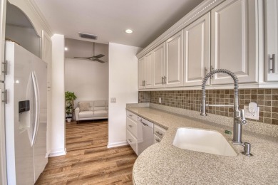 This beautifully updated 3 bedroom, 2 bath pool home is truly on Heritage Ridge Golf Club in Florida - for sale on GolfHomes.com, golf home, golf lot