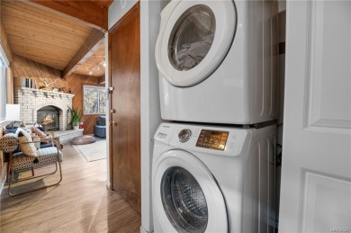 Tucked beneath majestic oaks and pines, this 3 bedroom, 2 bath on Big Bear Mountain Ski and Golf Resort in California - for sale on GolfHomes.com, golf home, golf lot