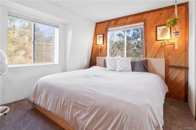 Tucked beneath majestic oaks and pines, this 3 bedroom, 2 bath on Big Bear Mountain Ski and Golf Resort in California - for sale on GolfHomes.com, golf home, golf lot