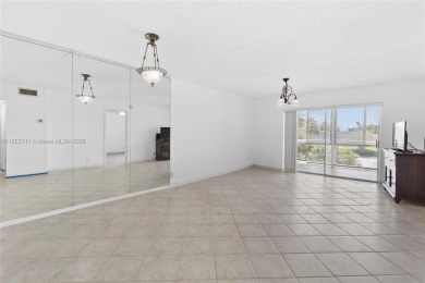 Motivated Seller! Beautifully updated 2BR/2BA condo in the on Oriole Golf and Tennis Club in Florida - for sale on GolfHomes.com, golf home, golf lot