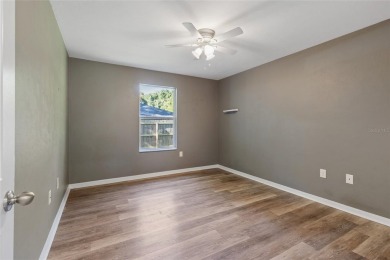 Welcome to this beautifully updated 3-bedroom, 2-bathroom home on Turkey Creek Golf and Country Club in Florida - for sale on GolfHomes.com, golf home, golf lot
