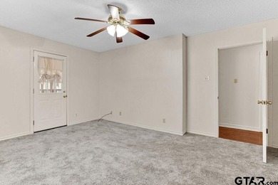 This comfortable home is nestled back in the pine trees on a on Hide-A-Way Lake Golf Course in Texas - for sale on GolfHomes.com, golf home, golf lot