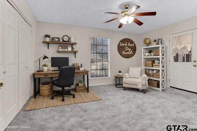 This comfortable home is nestled back in the pine trees on a on Hide-A-Way Lake Golf Course in Texas - for sale on GolfHomes.com, golf home, golf lot