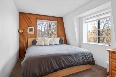 Tucked beneath majestic oaks and pines, this 3 bedroom, 2 bath on Big Bear Mountain Ski and Golf Resort in California - for sale on GolfHomes.com, golf home, golf lot