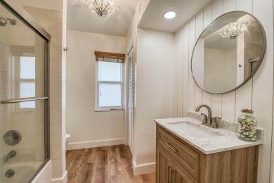 This beautifully updated 3 bedroom, 2 bath pool home is truly on Heritage Ridge Golf Club in Florida - for sale on GolfHomes.com, golf home, golf lot