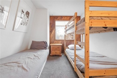 Tucked beneath majestic oaks and pines, this 3 bedroom, 2 bath on Big Bear Mountain Ski and Golf Resort in California - for sale on GolfHomes.com, golf home, golf lot