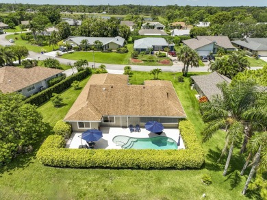This beautifully updated 3 bedroom, 2 bath pool home is truly on Heritage Ridge Golf Club in Florida - for sale on GolfHomes.com, golf home, golf lot