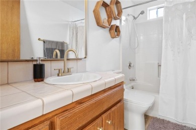Tucked beneath majestic oaks and pines, this 3 bedroom, 2 bath on Big Bear Mountain Ski and Golf Resort in California - for sale on GolfHomes.com, golf home, golf lot