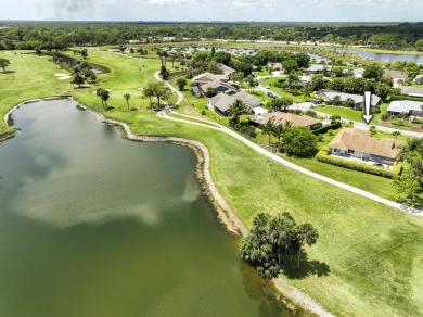 This beautifully updated 3 bedroom, 2 bath pool home is truly on Heritage Ridge Golf Club in Florida - for sale on GolfHomes.com, golf home, golf lot