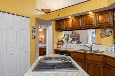 If low maintenance lifestyle and beautiful views are your thing on Bella Vista - Metfield Golf Complex and Country Club in Arkansas - for sale on GolfHomes.com, golf home, golf lot