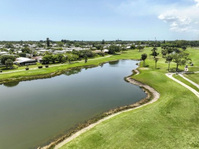 This beautifully updated 3 bedroom, 2 bath pool home is truly on Heritage Ridge Golf Club in Florida - for sale on GolfHomes.com, golf home, golf lot