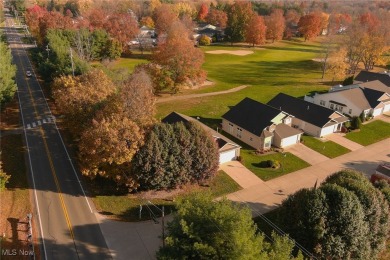 Welcome to your oasis, a meticulously updated ranch-style haven on Mayfair Country Club in Ohio - for sale on GolfHomes.com, golf home, golf lot