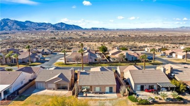 Located on the golf course, boasting breathtaking views of the on Mojave Resort Golf Club in Nevada - for sale on GolfHomes.com, golf home, golf lot