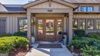 Nestled within the prestigious Reynolds Lake Oconee community on Reynolds Lake Oconee - The National  in Georgia - for sale on GolfHomes.com, golf home, golf lot