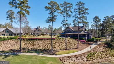 Nestled within the prestigious Reynolds Lake Oconee community on Reynolds Lake Oconee - The National  in Georgia - for sale on GolfHomes.com, golf home, golf lot