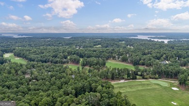 Nestled within the prestigious Reynolds Lake Oconee community on Reynolds Lake Oconee - The National  in Georgia - for sale on GolfHomes.com, golf home, golf lot