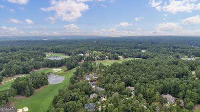 Nestled within the prestigious Reynolds Lake Oconee community on Reynolds Lake Oconee - The National  in Georgia - for sale on GolfHomes.com, golf home, golf lot