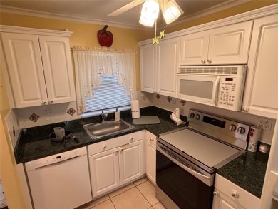 Golf, indoor and outdoor pools, tennis, movies and pickleball on Sunrise Lakes Phase III in Florida - for sale on GolfHomes.com, golf home, golf lot