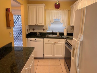 Golf, indoor and outdoor pools, tennis, movies and pickleball on Sunrise Lakes Phase III in Florida - for sale on GolfHomes.com, golf home, golf lot