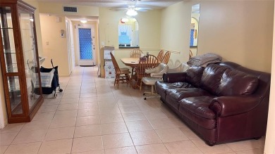 Golf, indoor and outdoor pools, tennis, movies and pickleball on Sunrise Lakes Phase III in Florida - for sale on GolfHomes.com, golf home, golf lot