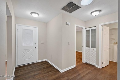 Tucked inside one of New Smyrna Beach's most peaceful golf-side on Hidden Lakes Golf Club in Florida - for sale on GolfHomes.com, golf home, golf lot