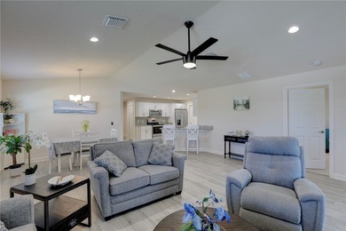 Easy Life. Lasting Style. Nearly new concrete block home in a on Spanish Lakes Country Club in Florida - for sale on GolfHomes.com, golf home, golf lot