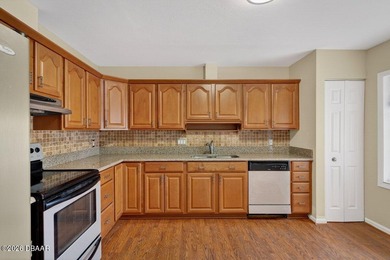 Tucked inside one of New Smyrna Beach's most peaceful golf-side on Hidden Lakes Golf Club in Florida - for sale on GolfHomes.com, golf home, golf lot