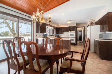 Sprawling brick ranch on a quiet culdesac overlooking the #11 on Travis Pointe Country Club in Michigan - for sale on GolfHomes.com, golf home, golf lot