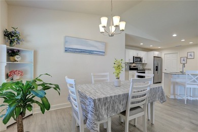 Easy Life. Lasting Style. Nearly new concrete block home in a on Spanish Lakes Country Club in Florida - for sale on GolfHomes.com, golf home, golf lot