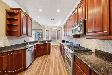 Experience the Florida lifestyle in the gated community of The on Glen Abbey Golf Club in Florida - for sale on GolfHomes.com, golf home, golf lot