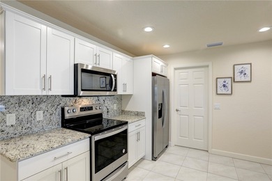 Easy Life. Lasting Style. Nearly new concrete block home in a on Spanish Lakes Country Club in Florida - for sale on GolfHomes.com, golf home, golf lot