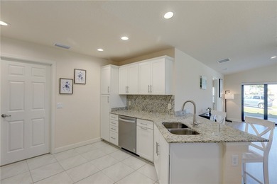 Easy Life. Lasting Style. Nearly new concrete block home in a on Spanish Lakes Country Club in Florida - for sale on GolfHomes.com, golf home, golf lot